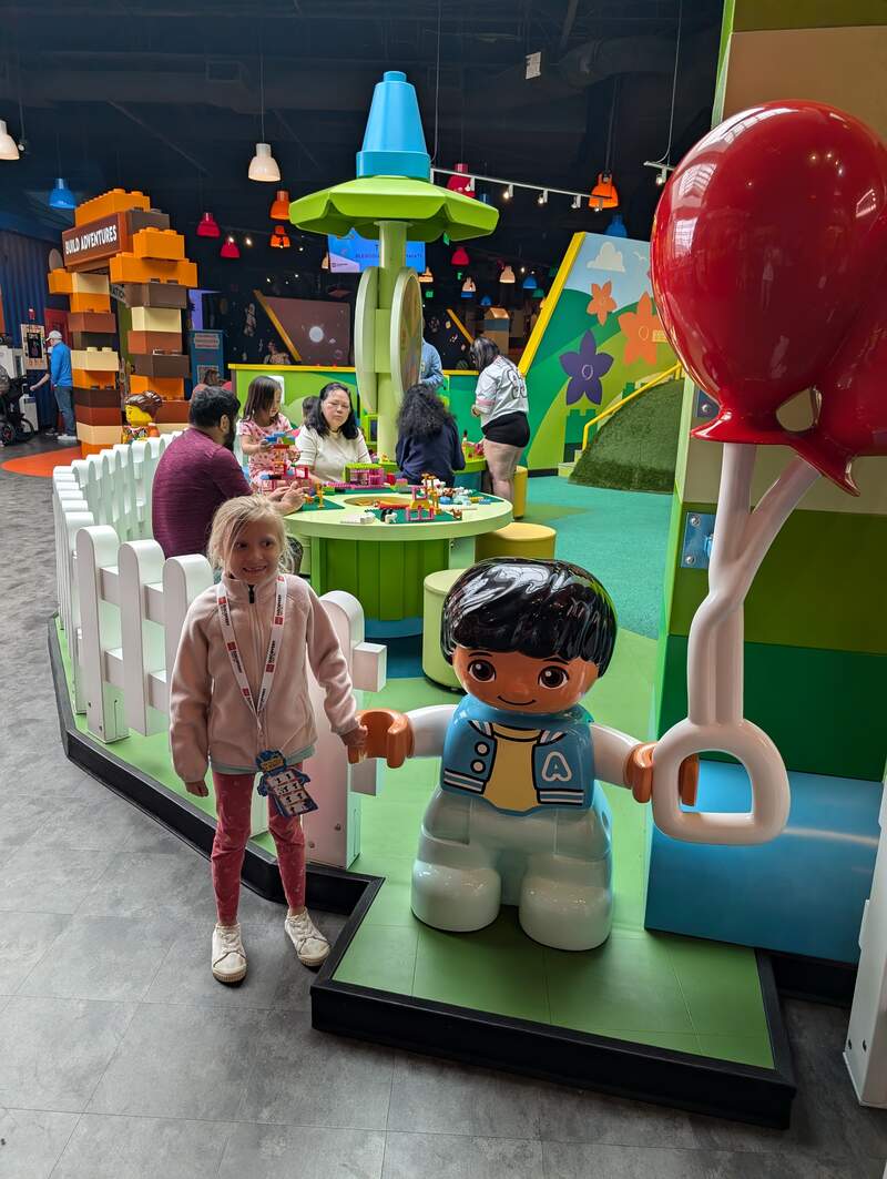 Eve at Legoland Holding hands with Duplo minifig
