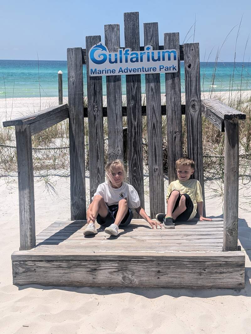 Eve and Noah in a giant chair